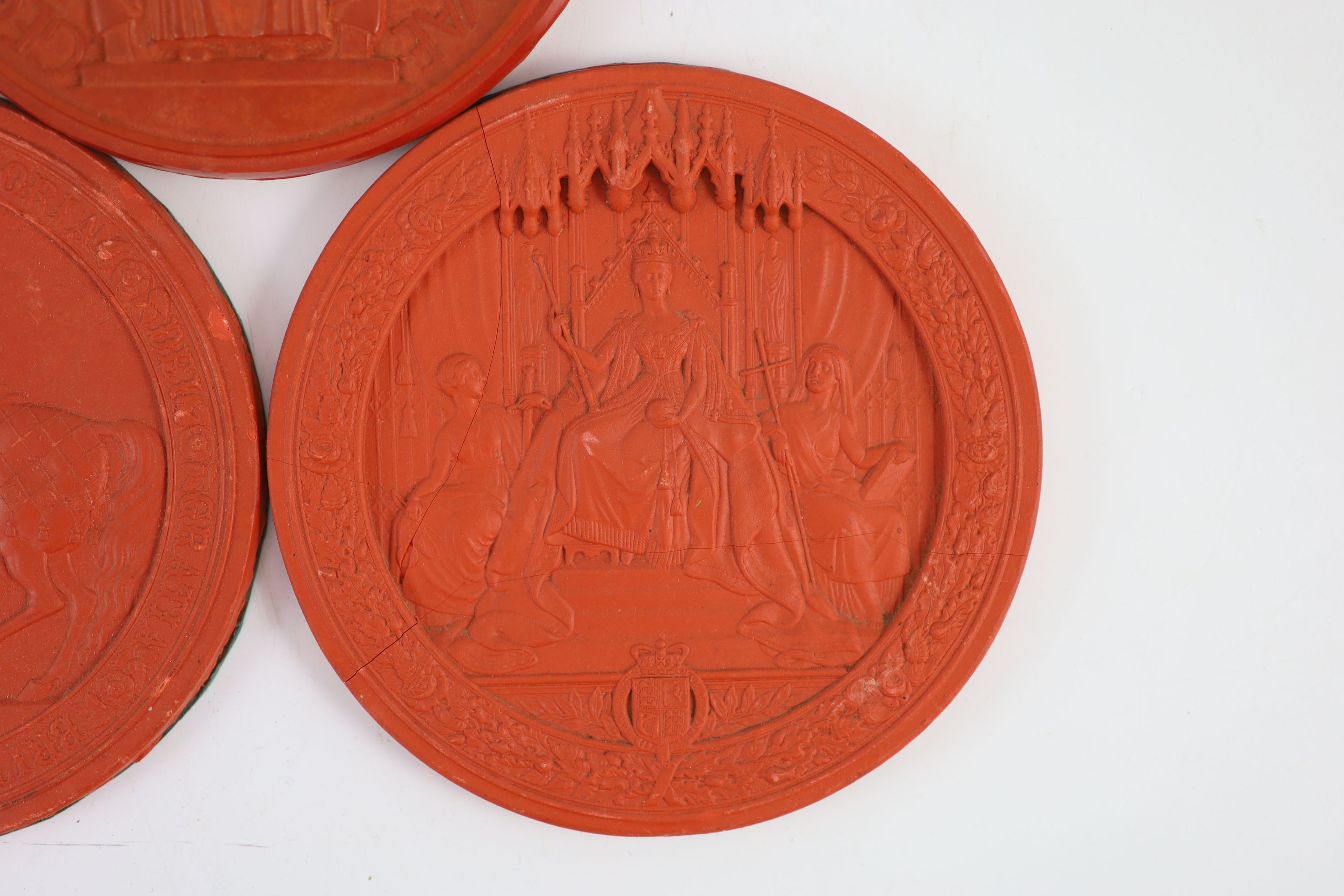 Three red wax Great Seals, two Queen Victorian Great Seals of the Realm, and a George V seal, 16.5 and 16 cm diameter